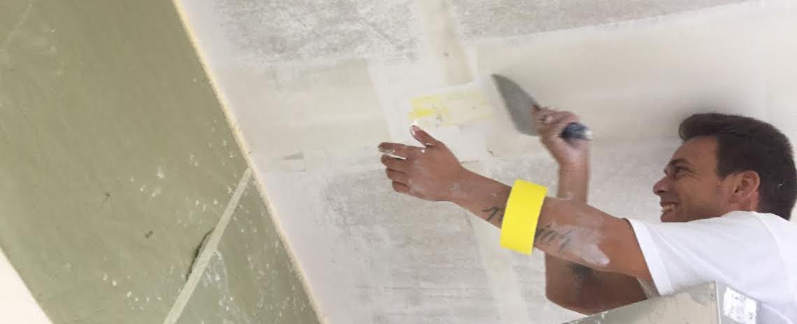 worker helping with popcorn ceiling removal in Alameda, CA