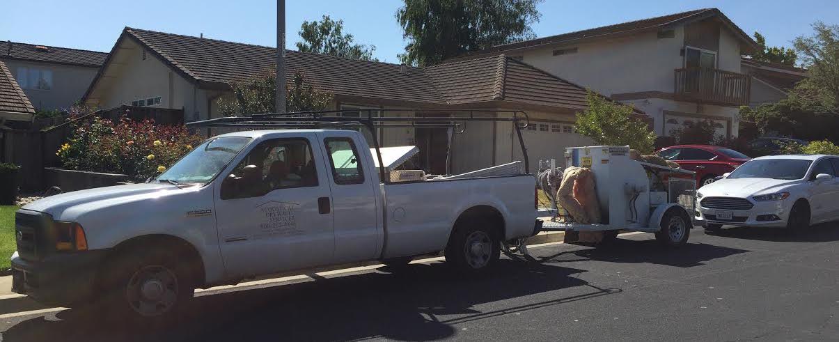acoustical drywall services truck in front of Santa Clara home in need of popcorn ceiling removal